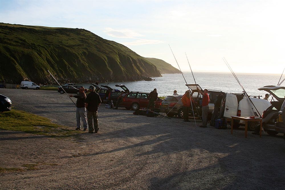 Anglers arrive at the car park ready to participate